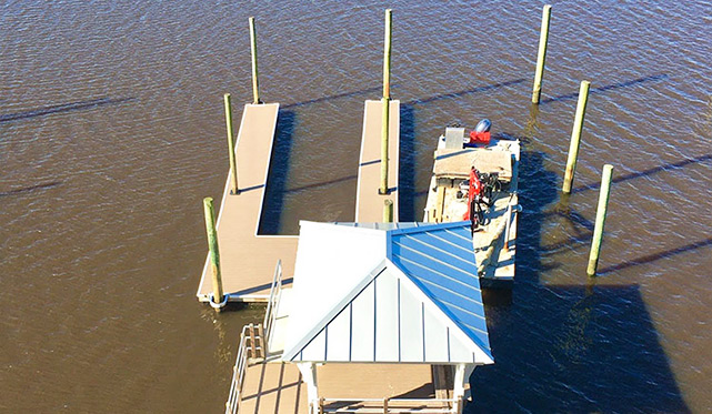 Pile driving with steel crane barge in Wilmington NC